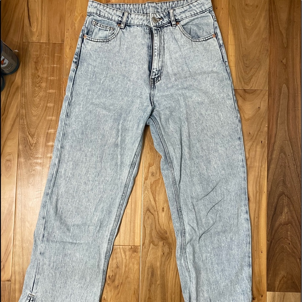 Flare jeans with ankle slit